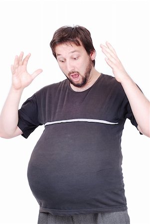 fat man exercising - Surprised man with a big stomach, pregnant or fat Stock Photo - Budget Royalty-Free & Subscription, Code: 400-04619304