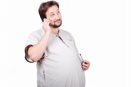 fat man exercising - Young male with big stomach with enjoying expression on his face speaking on phone Stock Photo - Budget Royalty-Free & Subscription, Code: 400-04619310