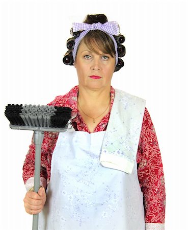 plump - Unhappy and apathetic frumpy housewife standing with broom. Stock Photo - Budget Royalty-Free & Subscription, Code: 400-04619512
