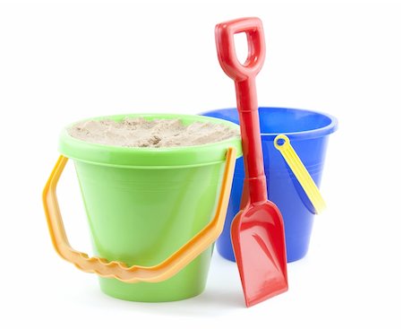 bucket and spade clsoe up on white background Stock Photo - Budget Royalty-Free & Subscription, Code: 400-04611464