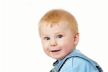 shy baby - Portrait of the blond little boy on a background Stock Photo - Budget Royalty-Free & Subscription, Code: 400-04612051