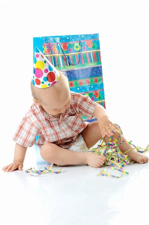 simsearch:400-07748141,k - Child boy in birthday hat over white Foto de stock - Super Valor sin royalties y Suscripción, Código: 400-04624898