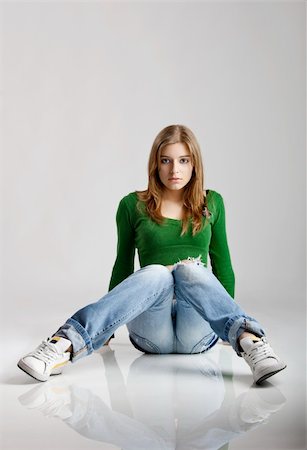 simsearch:400-04174787,k - Beautiful young fashion model seated on the floor Stock Photo - Budget Royalty-Free & Subscription, Code: 400-04625946