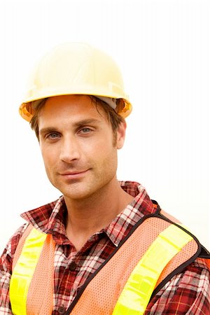 A Construction Worker on the job with a hard hat Foto de stock - Super Valor sin royalties y Suscripción, Código: 400-04626259