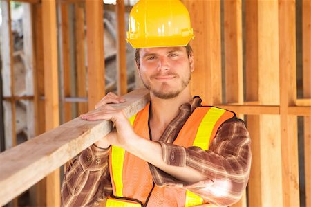 A Construction Worker on the job with a hard hat Stock Photo - Budget Royalty-Free & Subscription, Code: 400-04626266