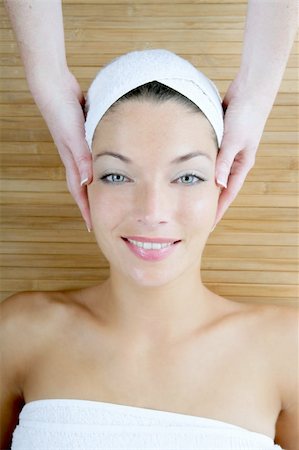 simsearch:400-05318677,k - Head massage over bamboo, beautiful blue eyes woman Stock Photo - Budget Royalty-Free & Subscription, Code: 400-04626986