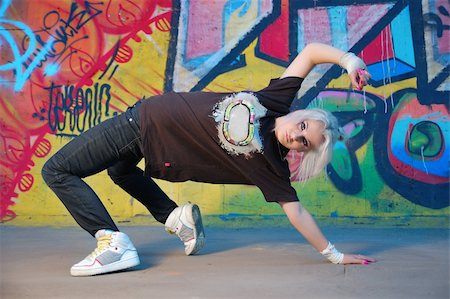 Young woman breakdancing Stock Photo - Budget Royalty-Free & Subscription, Code: 400-04627219