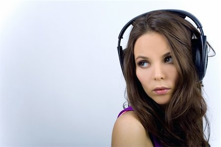 simsearch:400-04300097,k - Young dj girl in club clothes with headphones Stock Photo - Budget Royalty-Free & Subscription, Code: 400-04621866