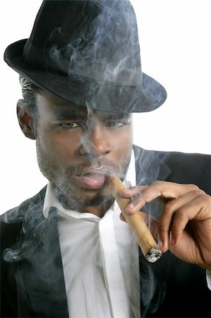 simsearch:400-04131198,k - African american man smoking cigar portrait with black hat Stock Photo - Budget Royalty-Free & Subscription, Code: 400-04622212