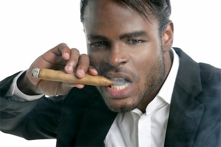 simsearch:400-05207678,k - African american man smoking cigar portrait with black hat Stock Photo - Budget Royalty-Free & Subscription, Code: 400-04622213