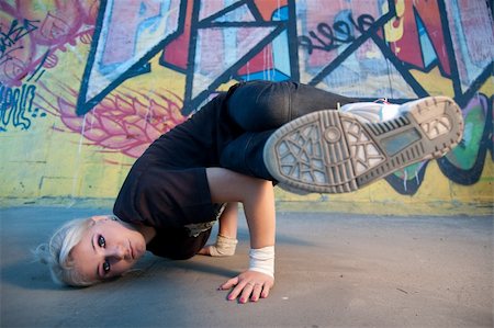 Young woman breakdancing Stock Photo - Budget Royalty-Free & Subscription, Code: 400-04634433