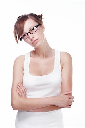 simsearch:400-04345762,k - Pretty Female Student wearing glasses isolated on white background Stock Photo - Budget Royalty-Free & Subscription, Code: 400-04635813