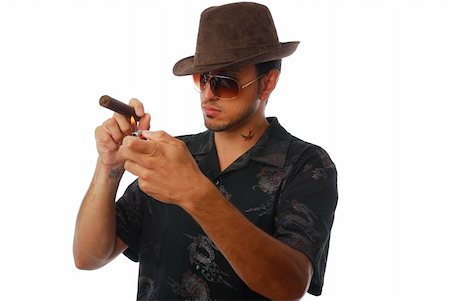 simsearch:400-05207678,k - Handsome man lighting a cigar Stock Photo - Budget Royalty-Free & Subscription, Code: 400-04636099