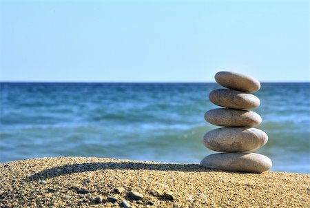 simsearch:400-04114367,k - Stones balances on the beach of blue sea Stock Photo - Budget Royalty-Free & Subscription, Code: 400-04636465