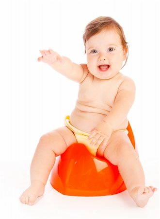 A happy lovely baby girl sitting on the potty Photographie de stock - Aubaine LD & Abonnement, Code: 400-04637386