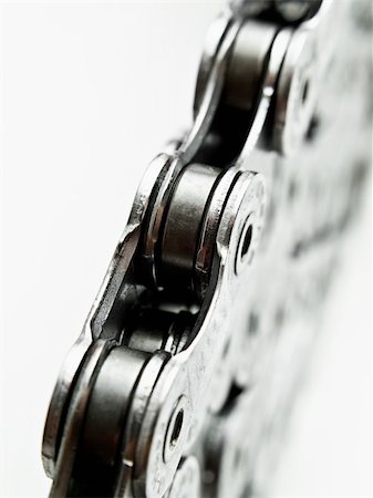 stacked bicycle chain macro,over white background, may suggest strength,unity... Stock Photo - Budget Royalty-Free & Subscription, Code: 400-04638695
