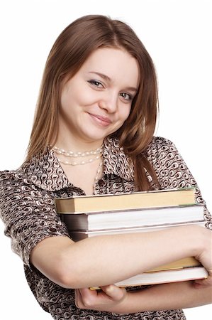 simsearch:400-04345762,k - Image of a girl carrying a lot of books Stock Photo - Budget Royalty-Free & Subscription, Code: 400-04639497