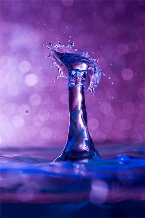 simsearch:614-06813723,k - Brightly coloured capture of a water drop collision Stock Photo - Budget Royalty-Free & Subscription, Code: 400-04630535