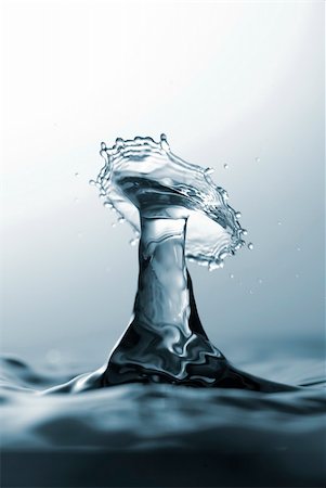 simsearch:614-06813723,k - Mid air capture of water a drop collision Stock Photo - Budget Royalty-Free & Subscription, Code: 400-04630539