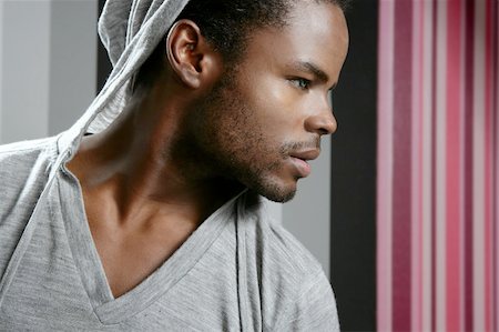 simsearch:400-04131198,k - African american man with gray hood over wallpaper background Stock Photo - Budget Royalty-Free & Subscription, Code: 400-04630795