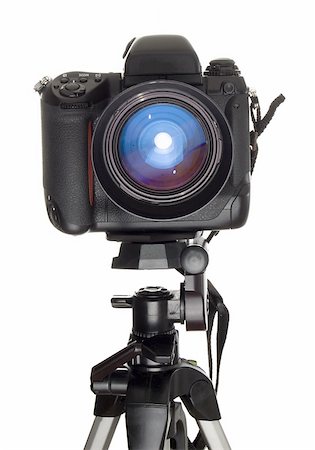 Professional digital camera over white background. Stock Photo - Budget Royalty-Free & Subscription, Code: 400-04631070