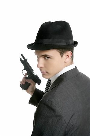 simsearch:400-04131198,k - Classic mafia portrait, man with black suit and gun, isolated on white Stock Photo - Budget Royalty-Free & Subscription, Code: 400-04631550