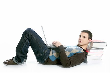 simsearch:400-04704759,k - Student boy lying on floor, books and laptop computer isolated on white Stock Photo - Budget Royalty-Free & Subscription, Code: 400-04631793