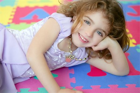 simsearch:400-07509444,k - Beautiful princess little girl smiling lying on the floor Stock Photo - Budget Royalty-Free & Subscription, Code: 400-04631895