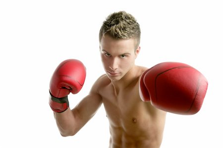 simsearch:400-04970057,k - Young  shaped man boxing, isolated studio shot Stock Photo - Budget Royalty-Free & Subscription, Code: 400-04632506