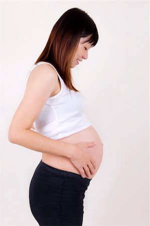 simsearch:400-04396054,k - 8 months pregnant Asian woman. Stock Photo - Budget Royalty-Free & Subscription, Code: 400-04633743