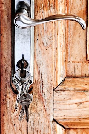 simsearch:400-04617631,k - Set of keys in lock of old wooden door Stock Photo - Budget Royalty-Free & Subscription, Code: 400-04633790