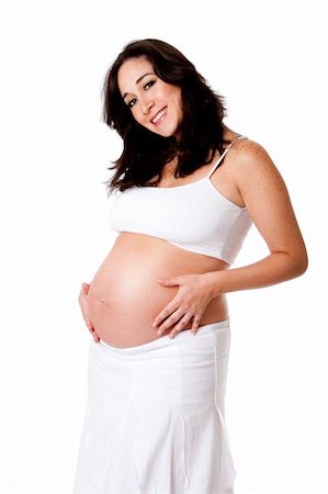 simsearch:400-04875116,k - Beautiful happy smiling pregnant woman dressed in white holding her belly, isolated Stock Photo - Budget Royalty-Free & Subscription, Code: 400-04644113