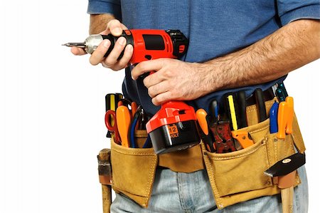 simsearch:400-03947919,k - detail on handyman manual worker, toolsbelt and red drill in his hands Stock Photo - Budget Royalty-Free & Subscription, Code: 400-04649780