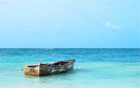 simsearch:600-02886000,k - Old boat floating in the Caribbean Sea on a sunny summer day. Stock Photo - Budget Royalty-Free & Subscription, Code: 400-04640096