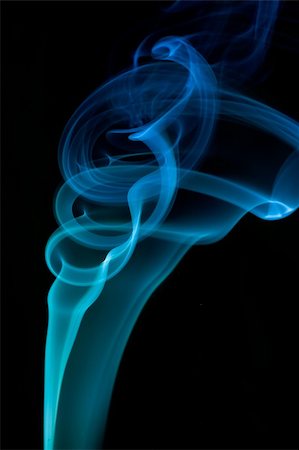 Abstract blue smoke over black background Photographie de stock - Aubaine LD & Abonnement, Code: 400-04650287