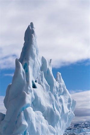 deform - Melting iceberg, slowly deforming into a strange looking but quite beautiful sculpture Stock Photo - Budget Royalty-Free & Subscription, Code: 400-04650510