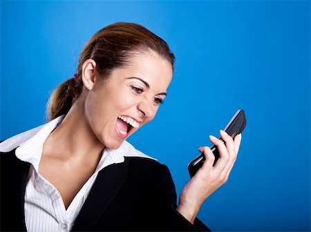 simsearch:400-04351235,k - Beautiful young businesswoman calling by cellular phone. Stock Photo - Budget Royalty-Free & Subscription, Code: 400-04650954