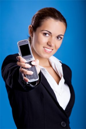 simsearch:400-04351235,k - Beautiful young businesswoman calling by cellular phone. Stock Photo - Budget Royalty-Free & Subscription, Code: 400-04650956