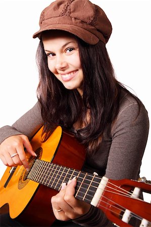 simsearch:400-04652753,k - Young woman playing acoustic guitar isolated on white background Stock Photo - Budget Royalty-Free & Subscription, Code: 400-04652753