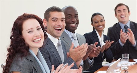 simsearch:400-04113367,k - Happy businessteam laughing and clapping in a meeting Stock Photo - Budget Royalty-Free & Subscription, Code: 400-04653191