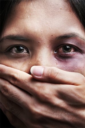 Woman being kidnapped and abused, a concept for domestic violence Stock Photo - Budget Royalty-Free & Subscription, Code: 400-04653742