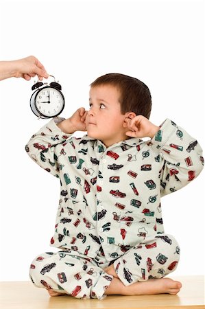 Kid does not want to hear about bedtime - isolated Stock Photo - Budget Royalty-Free & Subscription, Code: 400-04665032