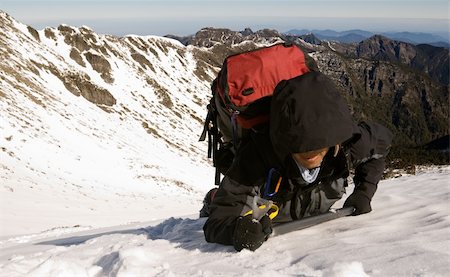 simsearch:400-05118687,k - Mountaineer climb on snow slap on winter mountain. Stock Photo - Budget Royalty-Free & Subscription, Code: 400-04667216