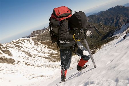 simsearch:400-05118687,k - Mountain climber with ice axe on snow slap. Stock Photo - Budget Royalty-Free & Subscription, Code: 400-04667217