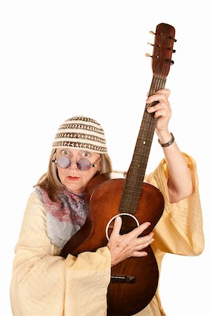simsearch:400-05372615,k - Crazy New Age Woman with Old Guitar Stock Photo - Budget Royalty-Free & Subscription, Code: 400-04668509