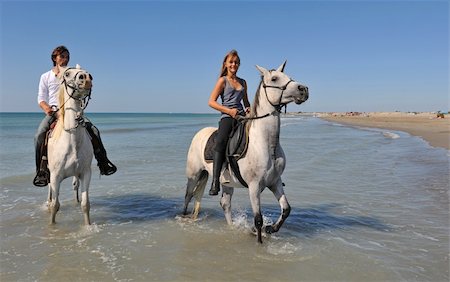 simsearch:400-06391487,k - father and daughter with arabian and camargue horses on the beach Stock Photo - Budget Royalty-Free & Subscription, Code: 400-04660370