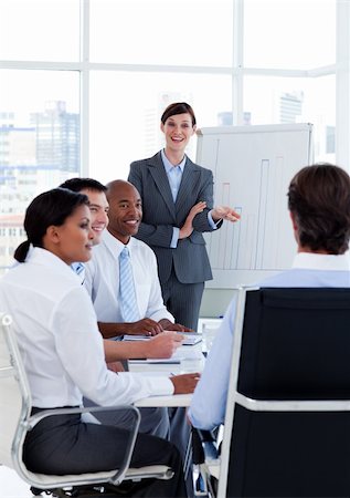 simsearch:400-04113367,k - Portrait of business people discussing a new strategy at a meeting Stock Photo - Budget Royalty-Free & Subscription, Code: 400-04660438