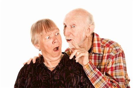 simsearch:400-04831298,k - Senior man talking to his shocked wife Stock Photo - Budget Royalty-Free & Subscription, Code: 400-04660872