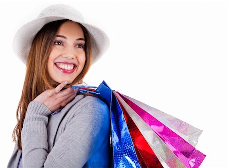 simsearch:400-04158321,k - Portrait of young beautiful model carrying her shopping bags indoor studio Stock Photo - Budget Royalty-Free & Subscription, Code: 400-04661186