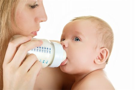 simsearch:400-06751007,k - Mother give drink her baby boy by feeding bottle Stock Photo - Budget Royalty-Free & Subscription, Code: 400-04662807